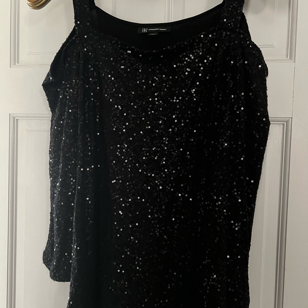 Black sequin shoulder strappy.  Perfect for New Years or a night out